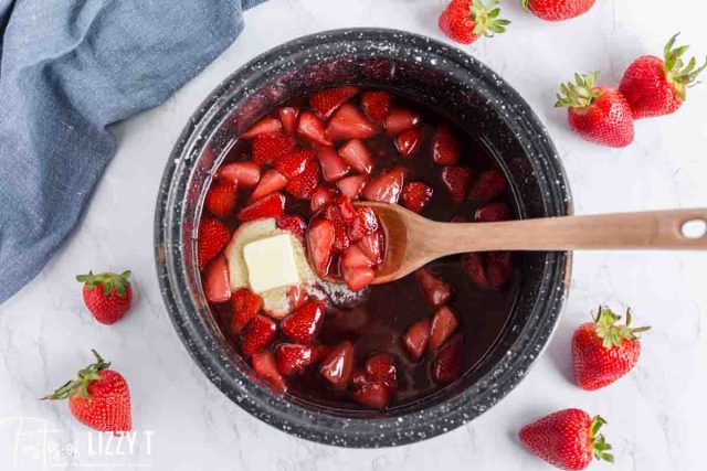 butter melting in strawberry sauce