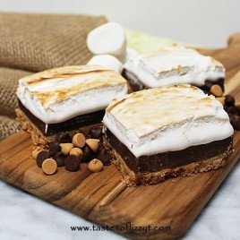 A graham cracker crust, sweet chocolate filling and crispy toasted marshmallow topping make up these Peanut Butter S'more Bars.