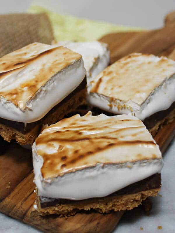 A graham cracker crust, sweet chocolate filling and crispy toasted marshmallow topping make up these Peanut Butter S'more Bars.