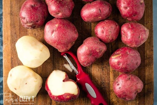 red potatoes on a cutting board