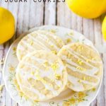 Light, tangy, crisp on the outside, chewy on the inside, soft lemon sugar cookies with a lemon glaze drizzle. Better than a bakery!