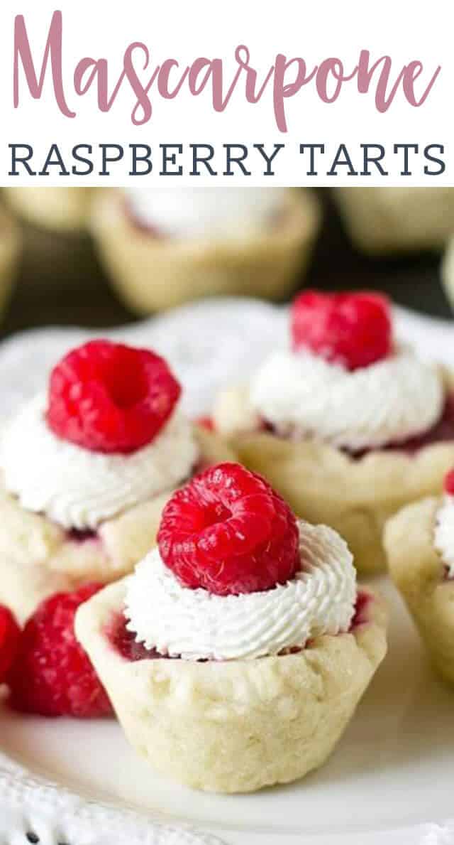 close up of red raspberry tarts