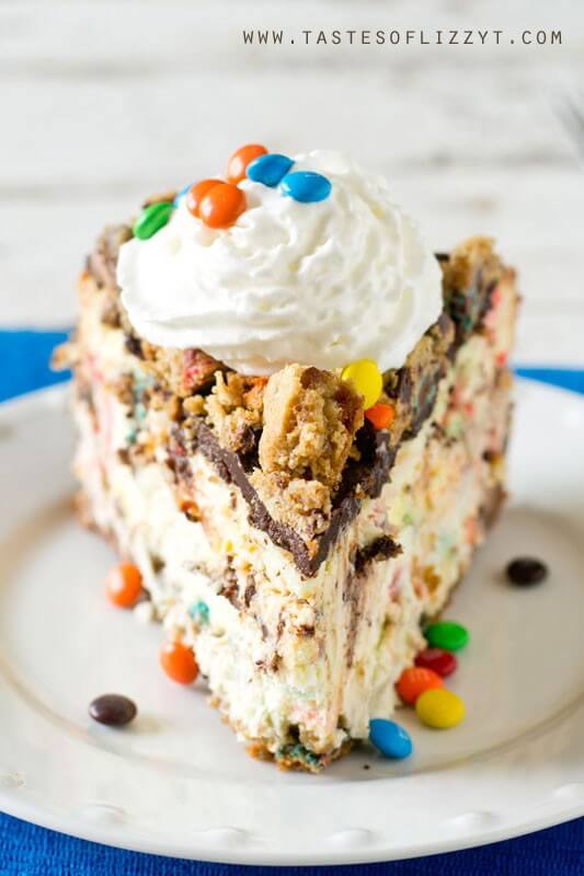 Your favorite cookie meets creamy cheesecake! This Monster Cookie Cheesecake will be a hit with cookie and cheesecake lovers alike. Cookie crust with M&M's swired throughout and a chocolate ganache topping.