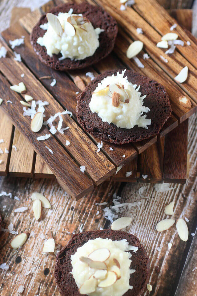 A Sweet coconut and almond filling is sandwiched between two soft baked brownie cookies. If there is ever a cookie you need to try – These Almond Joy Brownie Sandwich Cookies are the one!