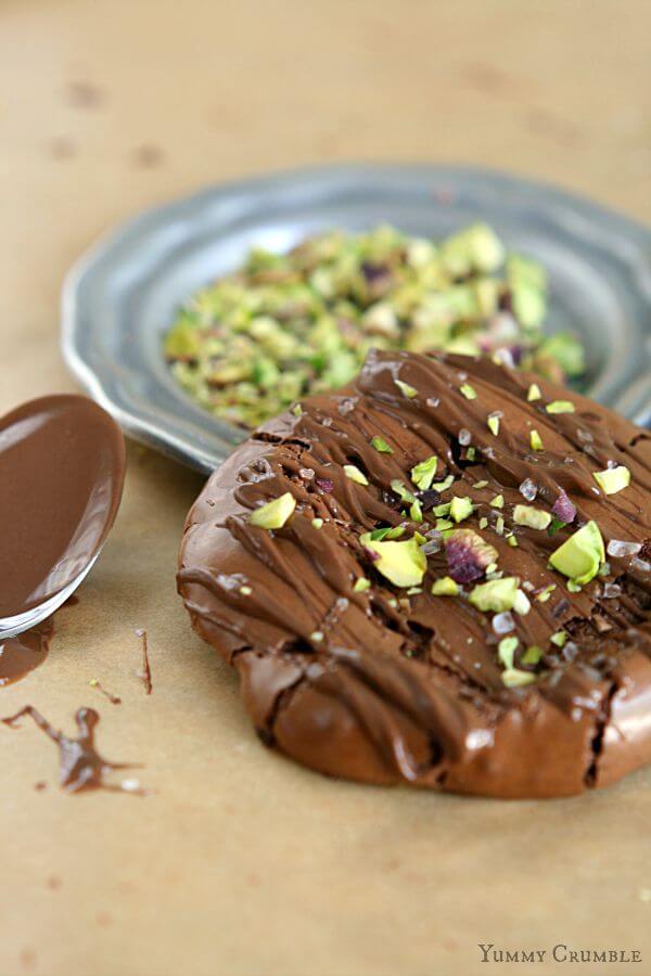 Rich dark chocolate, sea salt, Nutella and pistachios all packed into a flourless perfect little cookie. Don't let the title fool you. These Gluten Free Chocolate Pistachio Cookies will satisfy everyone's sweet tooth.