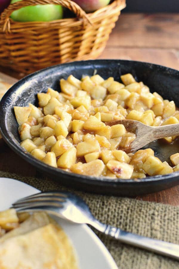making homemade apple pie filling in a skillet