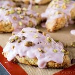 Learn how to make light, buttery, buttermilk scones. These glazed cherry buttermilk scones are topped with salty pistachio nuts.