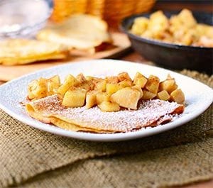Whole wheat apple pie crepes stuffed with vanilla yogurt and topped with apple pie filling.