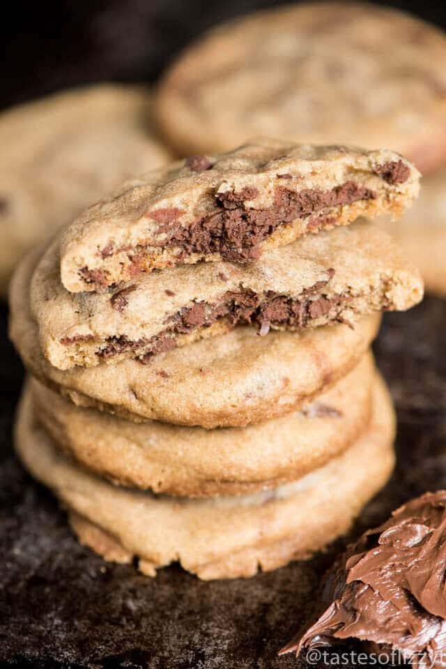 A close up of a stack of nutella filled cookies