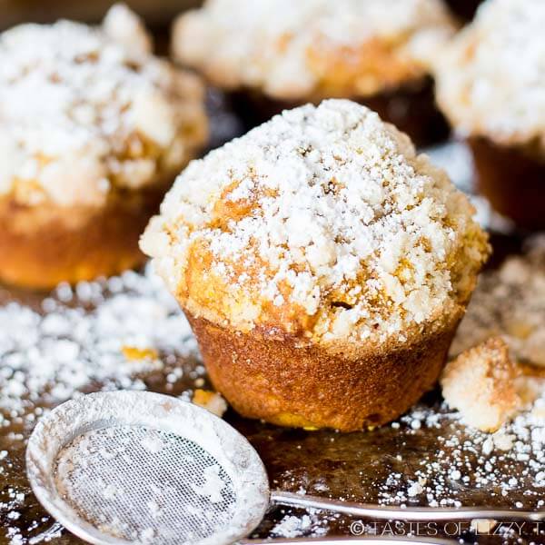 pumpkin spice muffins dusted with powdered sugar