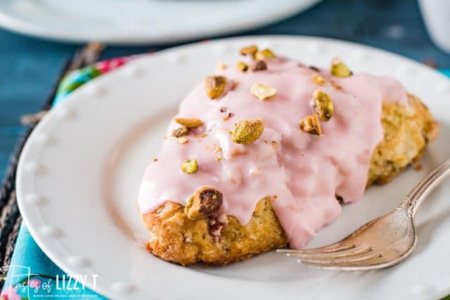 cherry scone with glaze on a plate