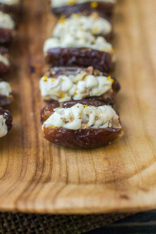 Dates stuffed with a lightly sweetened orange and honey cream cheese. Crunchy toasted walnuts make the perfect topping for this easy snack!