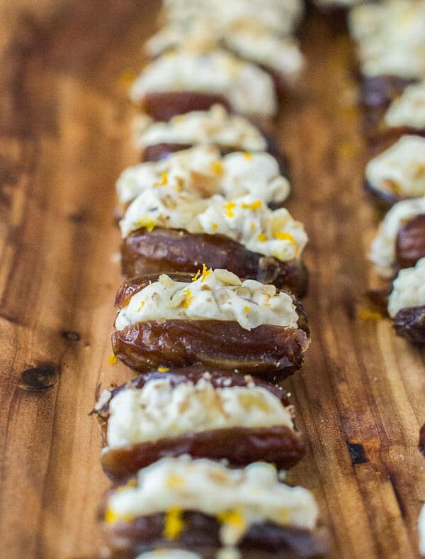 Dates stuffed with a lightly sweetened orange and honey cream cheese. Crunchy toasted walnuts make the perfect topping for this easy snack!