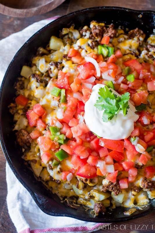 Top golden brown potatoes with your favorite taco ingredients for gluten free skillet Mexican potatoes the family will love!