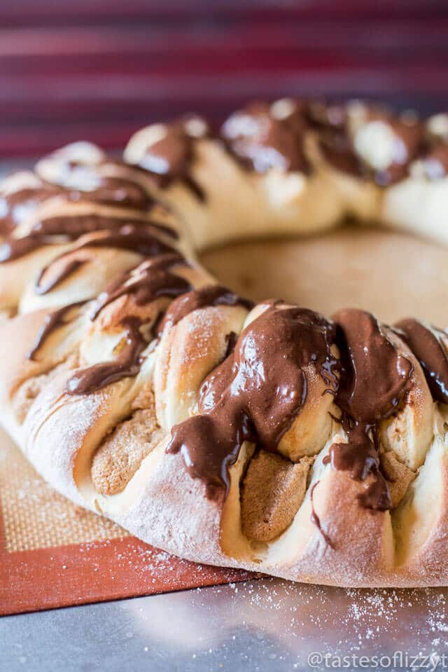 A sweet peanut butter filling stuffs this soft, braided coffee cake. Top with a chocolate glaze for a decadent breakfast treat!
