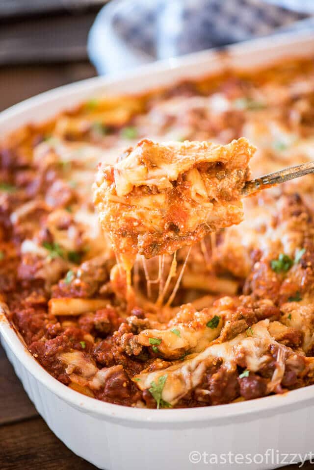 This easy baked ziti recipe is a layered Italian casserole full of noodles, ground beef and creamy cheese. It makes a large casserole and is great for leftovers!