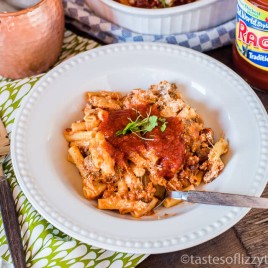 This easy baked ziti recipe is a layered Italian casserole full of noodles, ground beef and creamy cheese. It makes a large casserole and is great for leftovers!