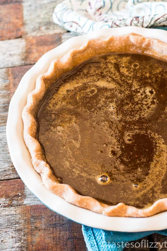 Quakertown Molasses Crumb Pie is an old-fashioned recipe that is similar to shoo-fly pie. Rich, gooey molasses filling baked with a crumb topping.
