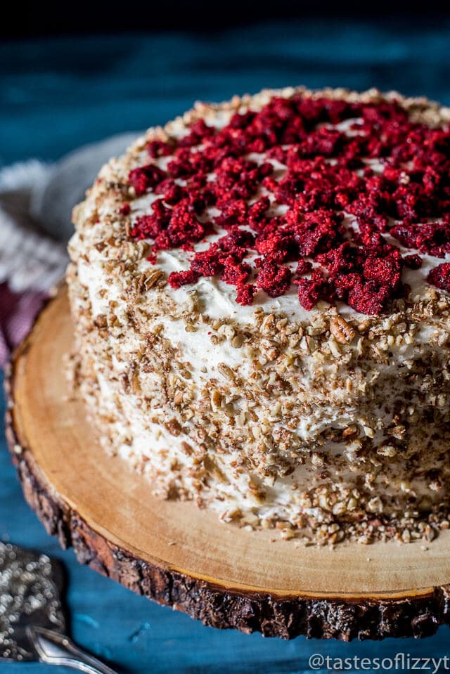 This triple layer red velvet cheesecake starts with a simple boxed cake