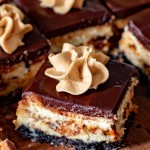 cheesecake bars on a cutting board