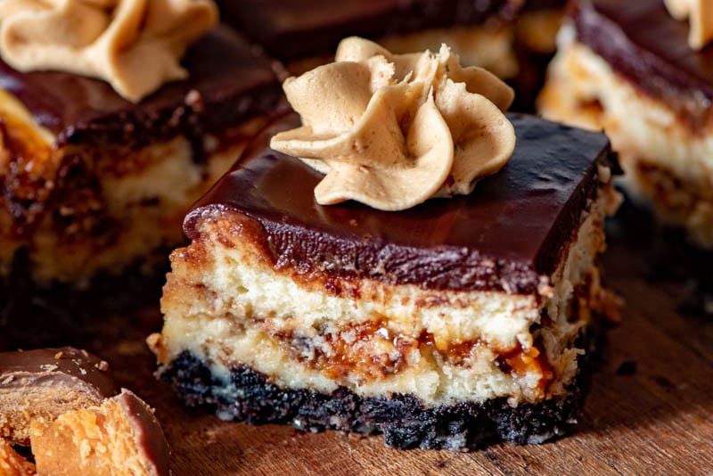 a peanut butter cheesecake bar on a table