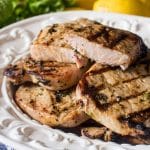 plate of grilled basil lemon pork chops