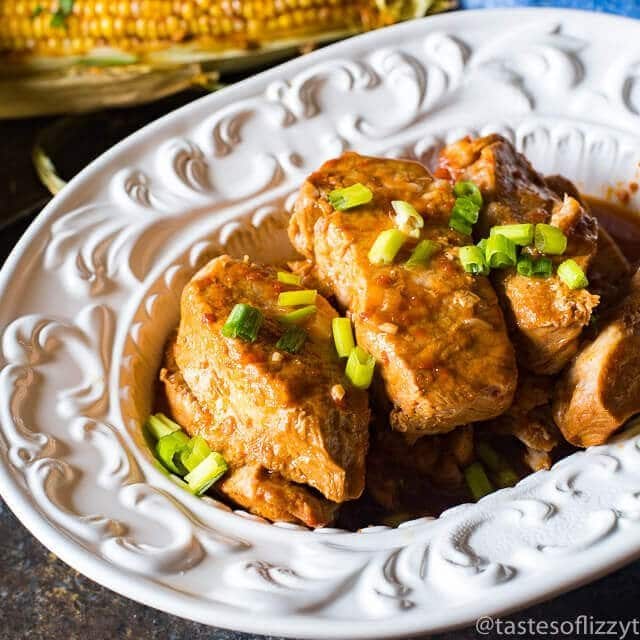 barbecue ribs in a white serving dish