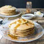 Whole wheat cinnamon pancakes that are light and fluffy. Maple butter makes the perfect topping for this fall breakfast!