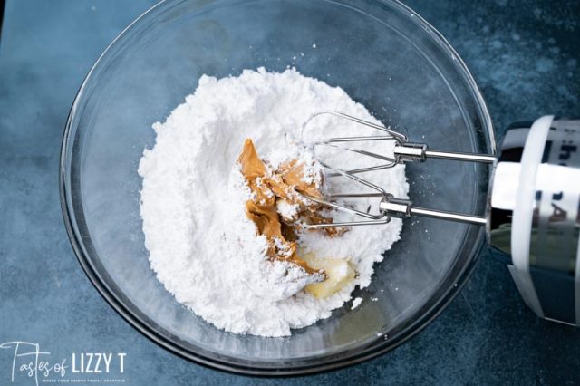 powdered sugar and peanut butter in a bowl