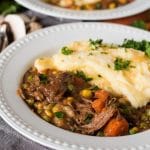 Slow Cooker Shepherd’s Pie is an easy way to enjoy a classic casserole. Fork-tender roast beef simmered with veggies & topped with cheesy mashed potatoes.