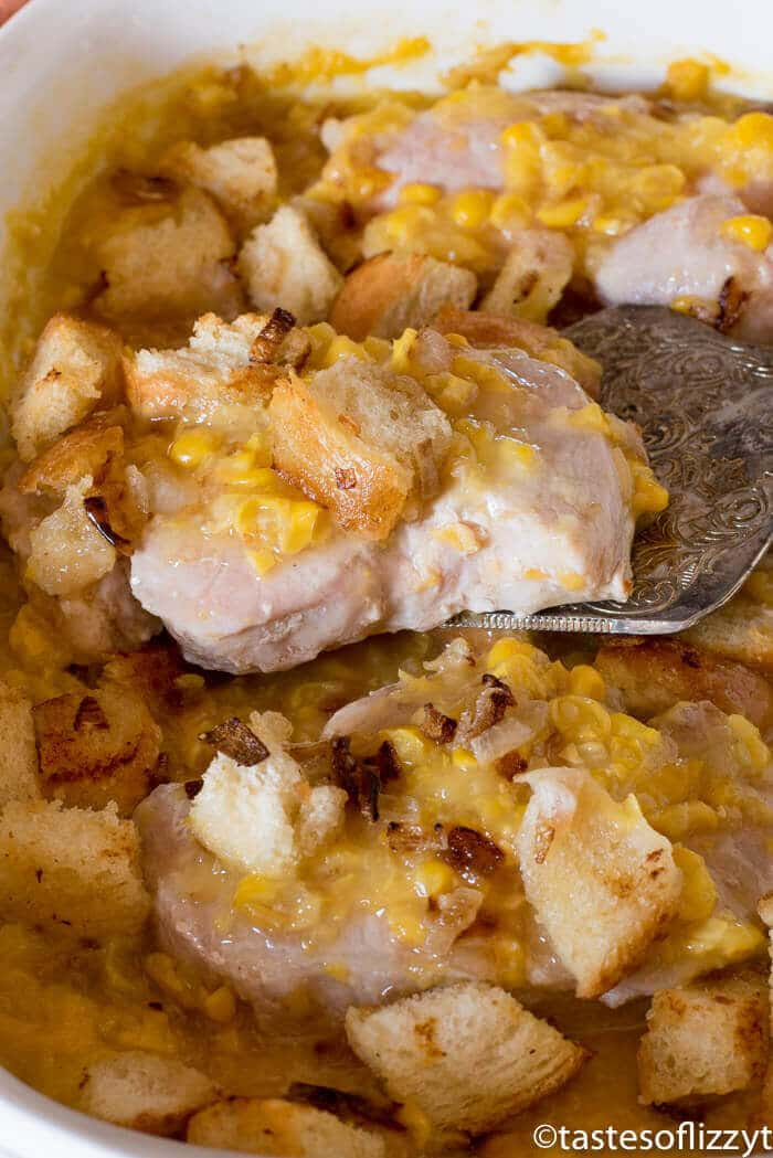buttery toasted bread crumbs on top of creamed corn casserole with pork chops