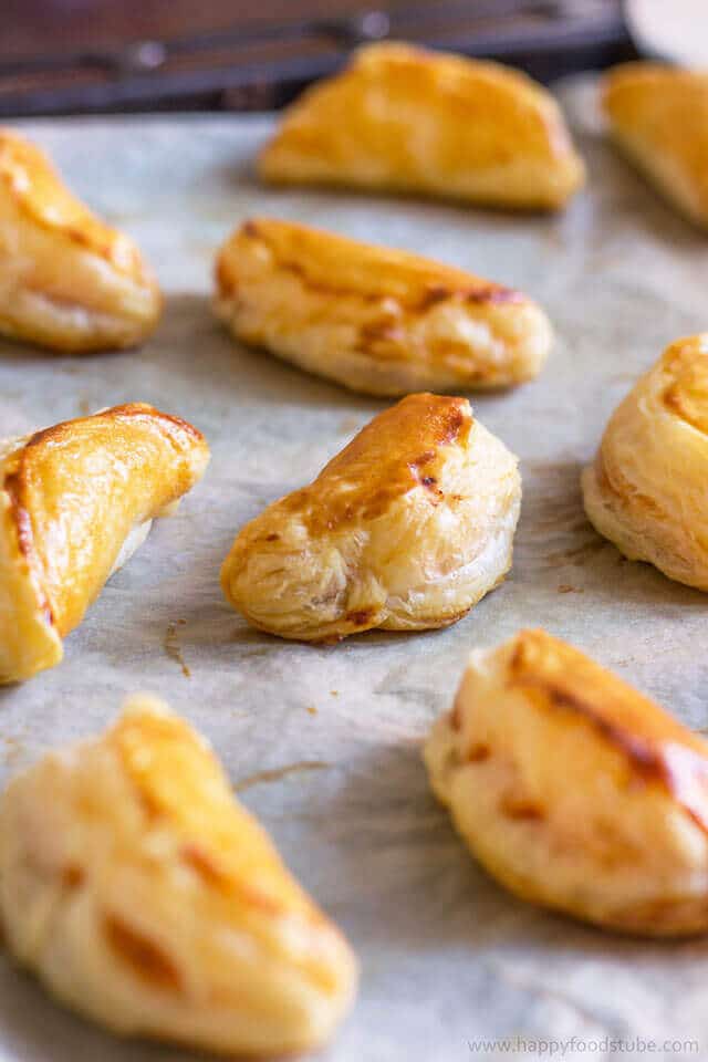 tuna empanadas on a baking sheet