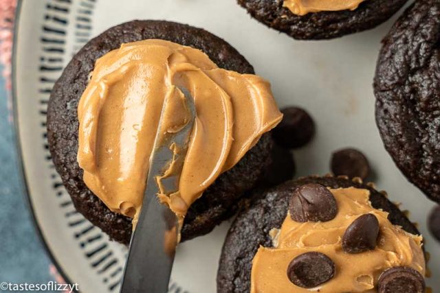 chocolate muffin with peanut butter spread on top