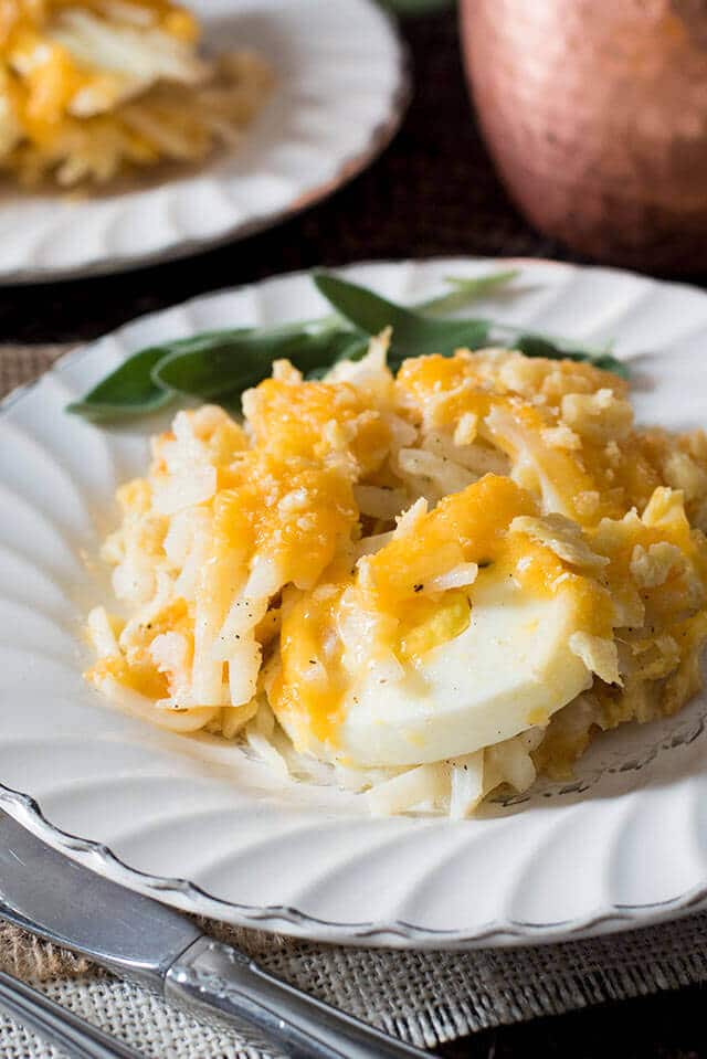 A plate of food on a table, with Egg and Potato