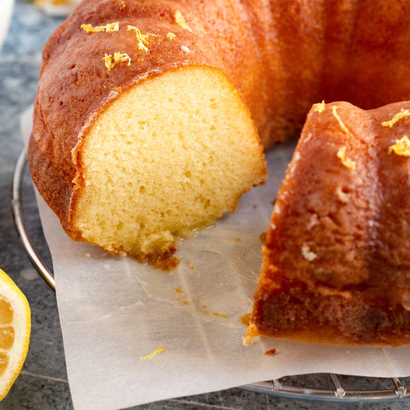 lemon bundt cake with one slice missing