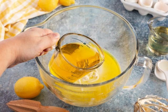 pouring jello into cake batter