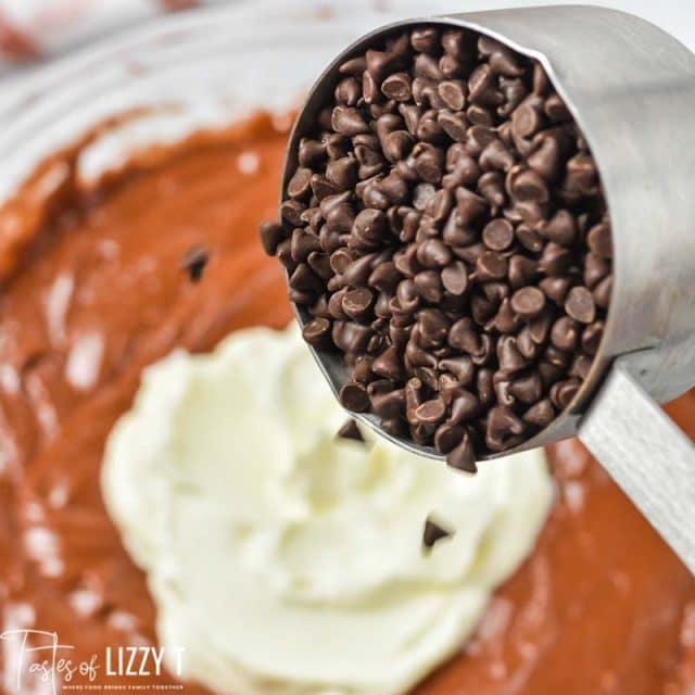 chocolate chips pouring into cake batter