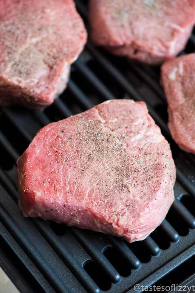 You've never had a steak like this! A homemade savory seasoned butter makes this Garlic Butter Steak melt in your mouth. Tips for grilling the best steak.