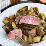 You've never had a steak like this! A homemade savory seasoned butter makes this Garlic Butter Steak melt in your mouth. Tips for grilling the best steak.