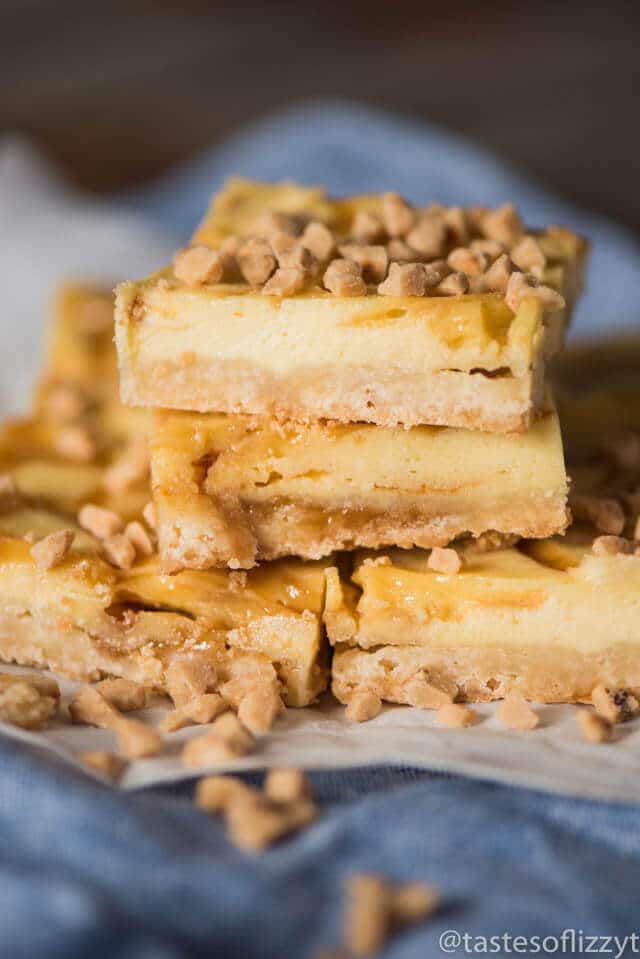 Looking for an easy dessert recipe for a potluck? Try these praline cheesecake bars with toffee bits and a shortbread crust. They're perfect on their own or with a scoop of ice cream drizzled with caramel.