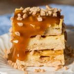 Looking for an easy dessert recipe for a potluck? Try these praline cheesecake bars with toffee bits and a shortbread crust. They're perfect on their own or with a scoop of ice cream drizzled with caramel.