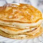 stack of sourdough pancakes with syrup