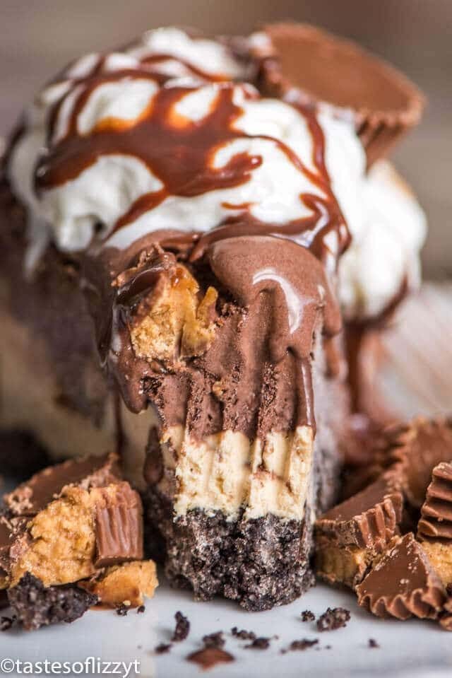 A close up of a piece of chocolate peanut butter ice cream pie