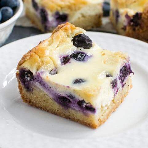 blueberry cheesecake bar on a plate