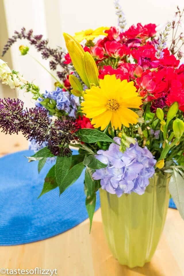 A bouquet of flowers in a vase on a table