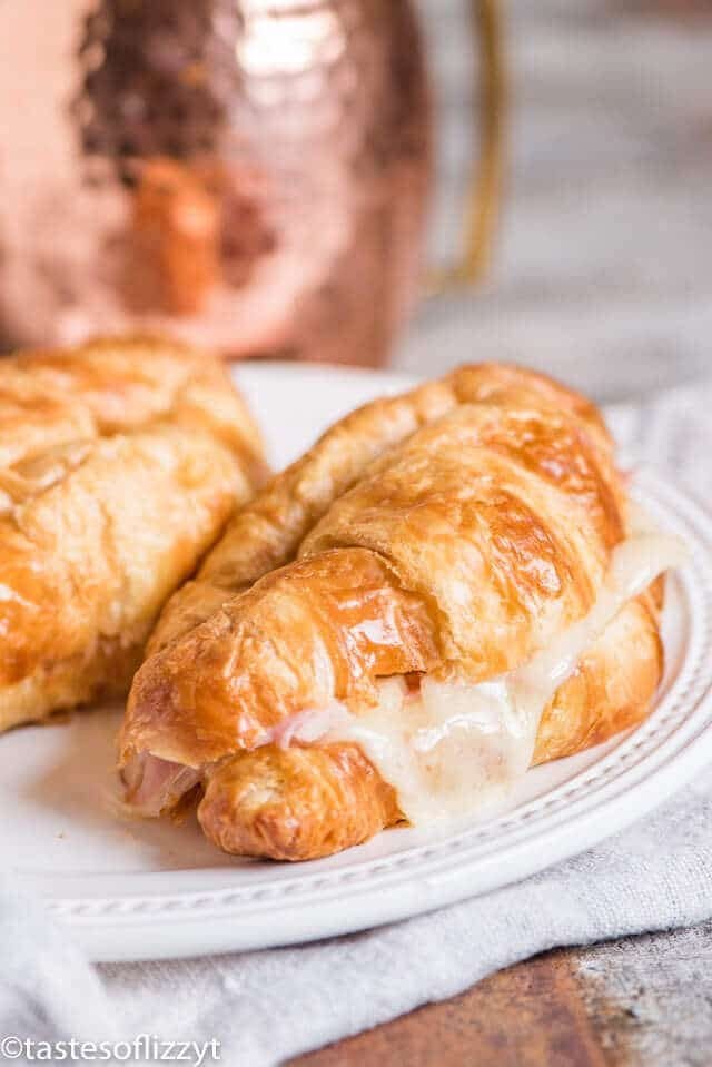 ham and cheese croissant sandwich on a plate