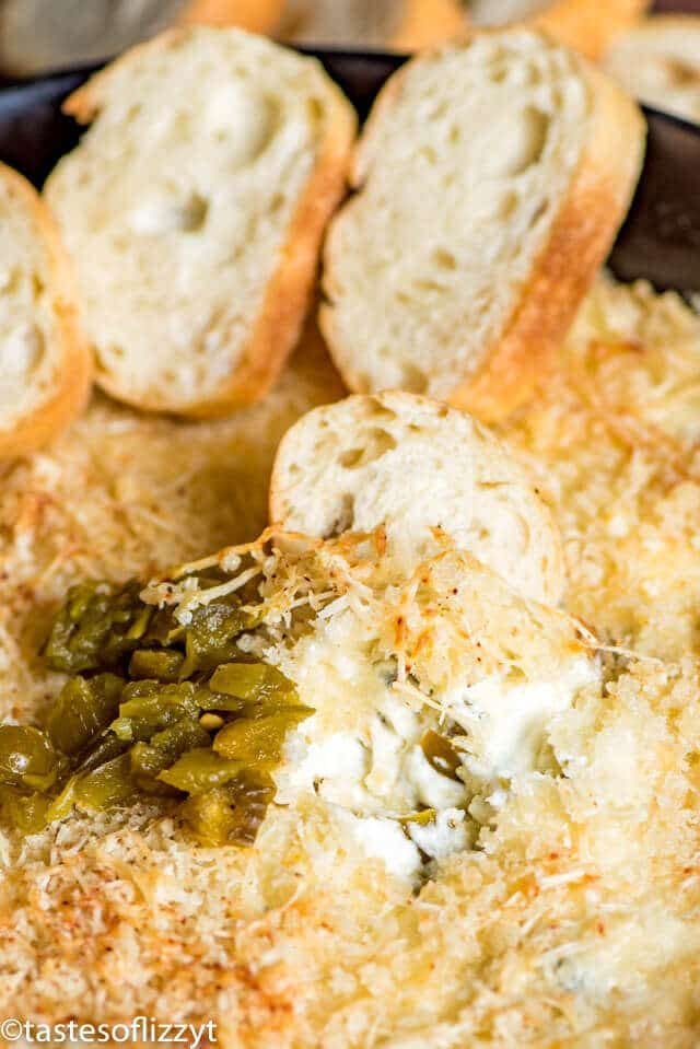 A close up of jalapeno popper dip with bread