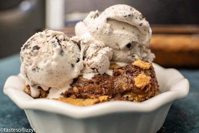 cookie bars in a bowl with ice cream