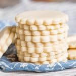 a stack of cut out sugar cookies