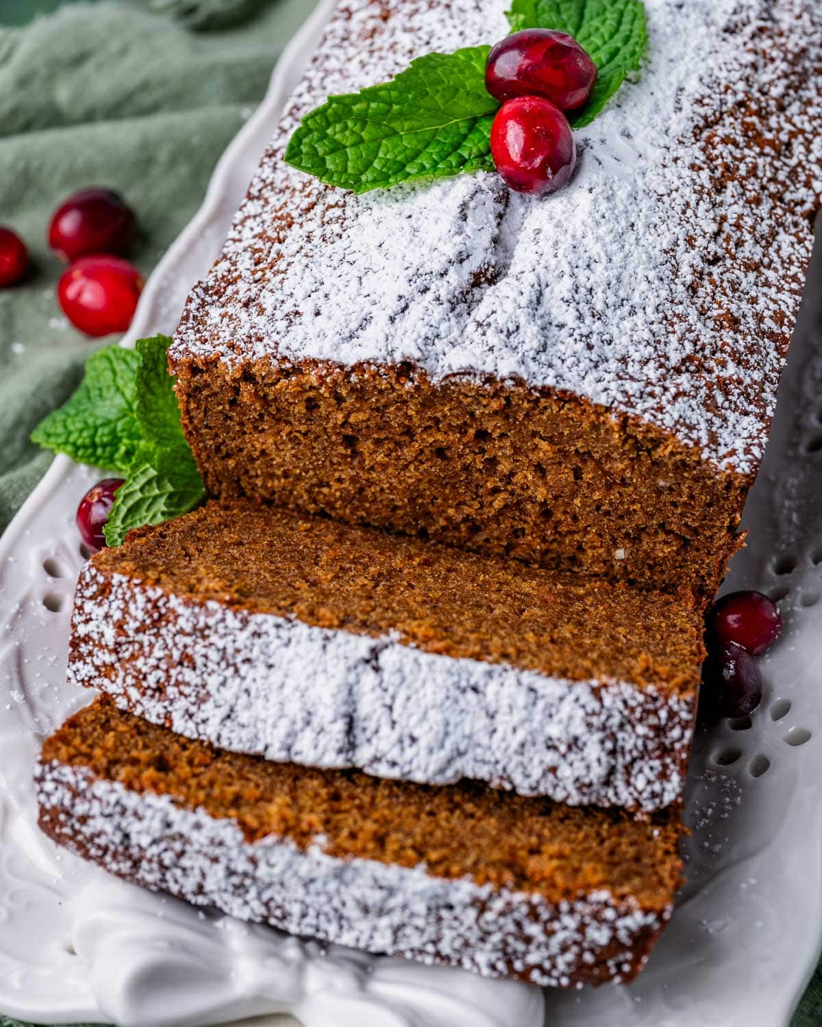 a gingerbread loaf with two slices cut